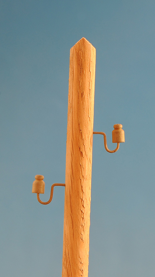 Einzelisolatoren f. Telegrafenleitung, geb. Trageisen, 100 Stück